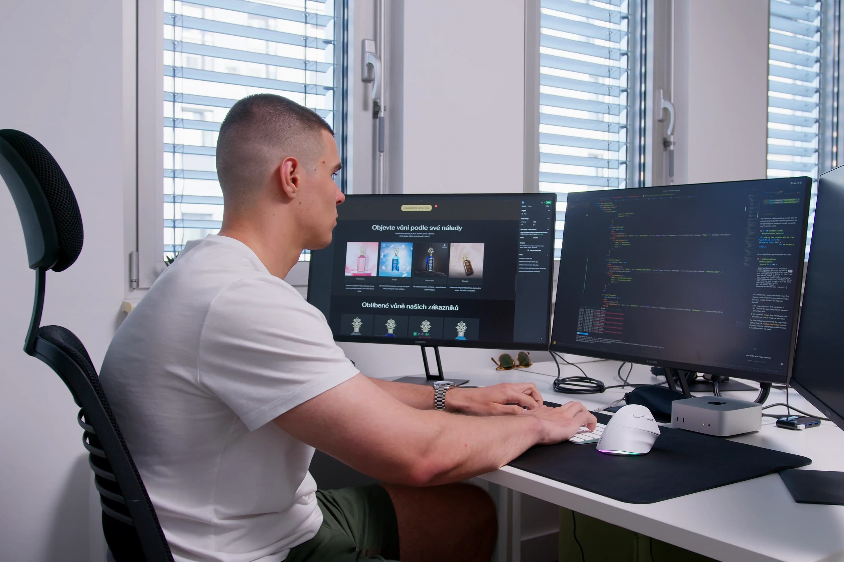 Adam Krampl working at his desk on a client storefront